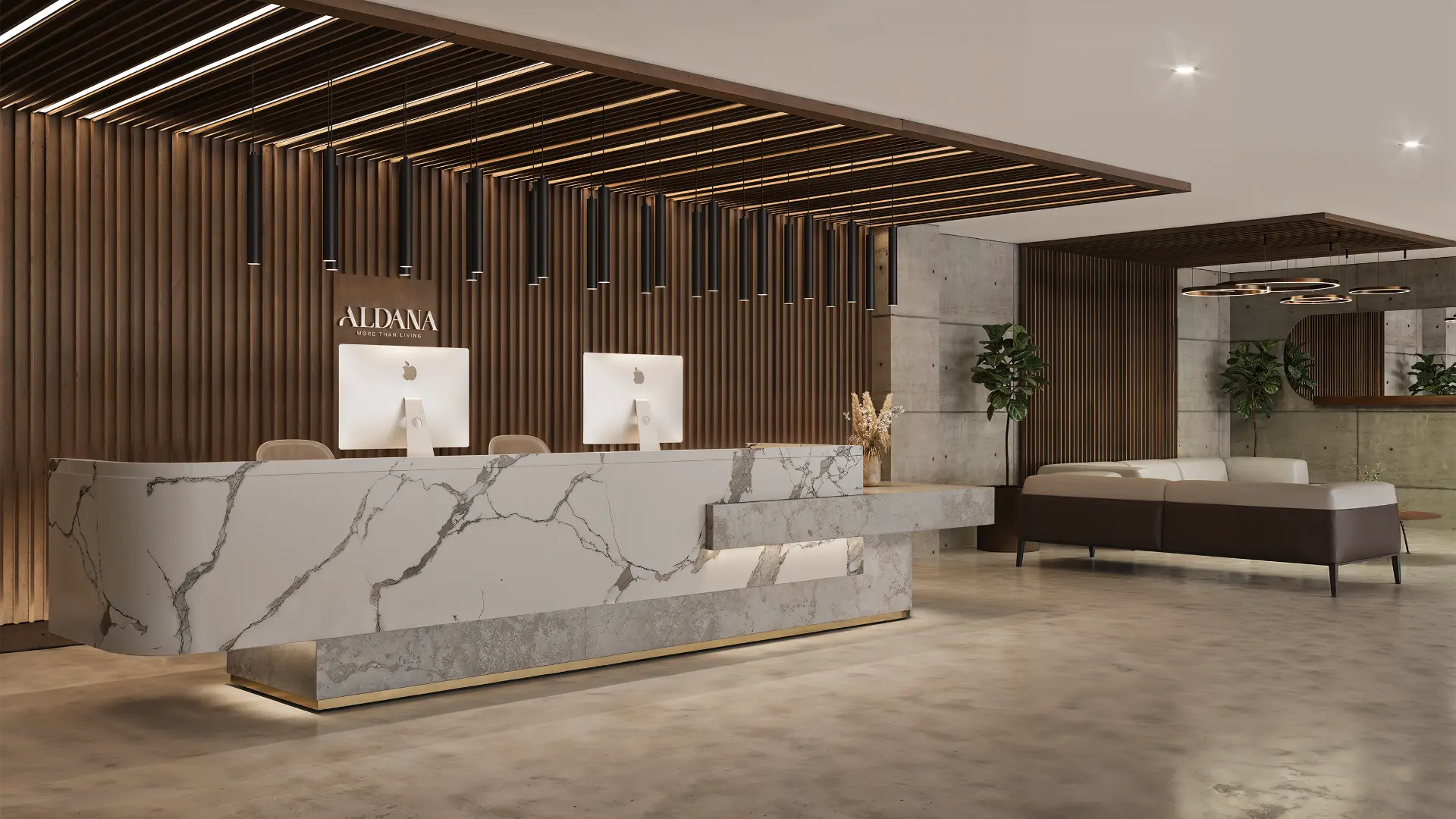 Lobby de doble altura de Aldana con mármol y madera